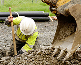 Worker digging